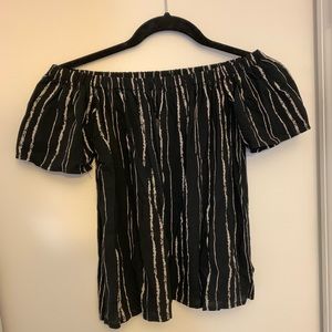 Black and white off-the-shoulder tee